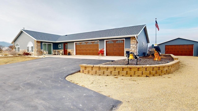 ranch-style home with a garage