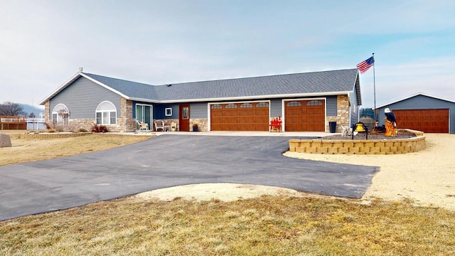 ranch-style home with a garage