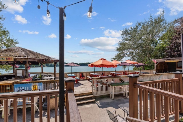deck featuring a water view