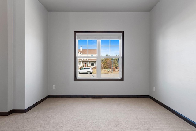 view of carpeted spare room