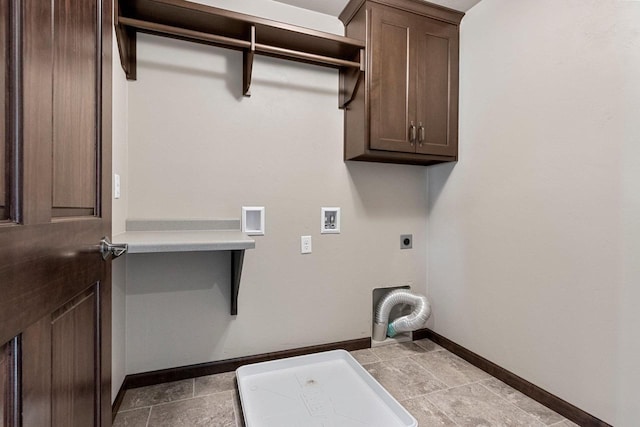 washroom featuring cabinets, hookup for a washing machine, and electric dryer hookup