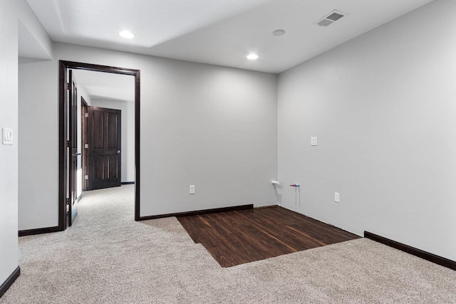 unfurnished room featuring carpet flooring