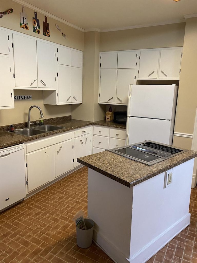 kitchen with white cabinetry, white appliances, sink, and ornamental molding