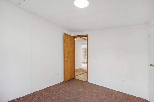 spare room with light colored carpet