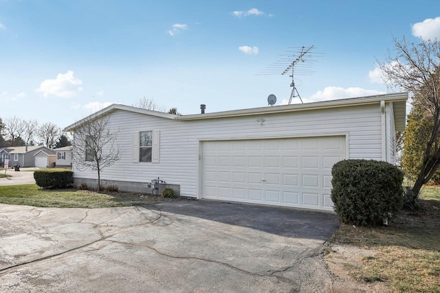 exterior space with a garage