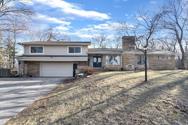 tri-level home featuring a garage