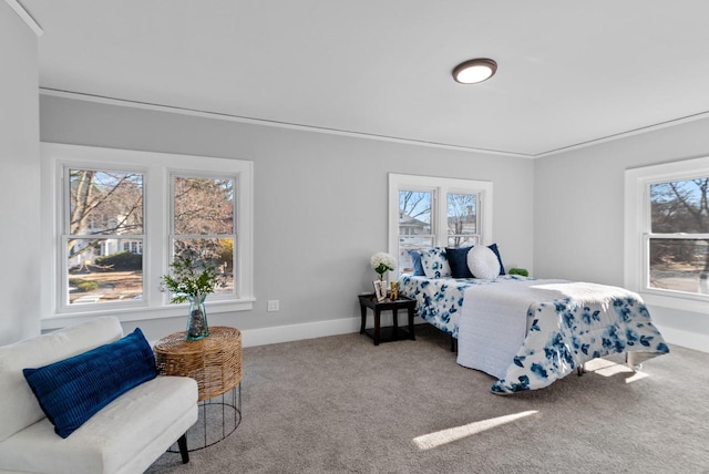 bedroom with carpet flooring and ornamental molding