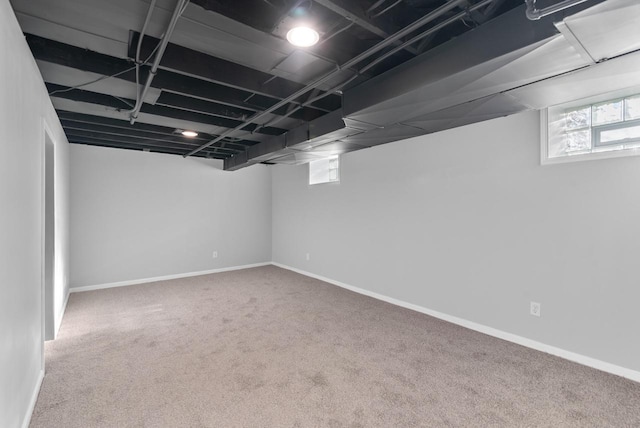 basement with carpet flooring