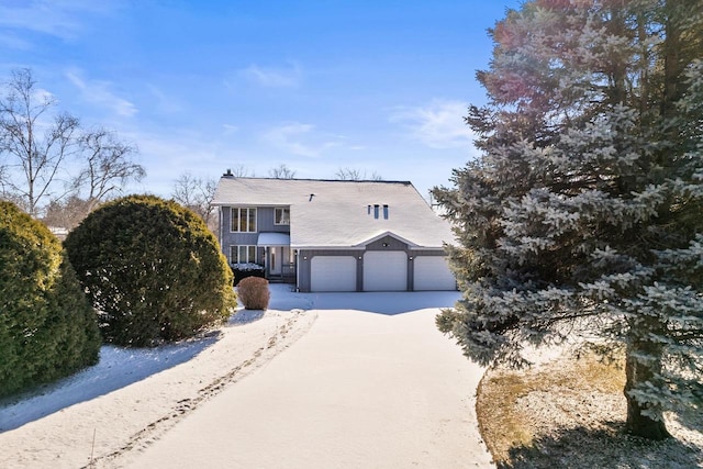 view of front of home with a garage