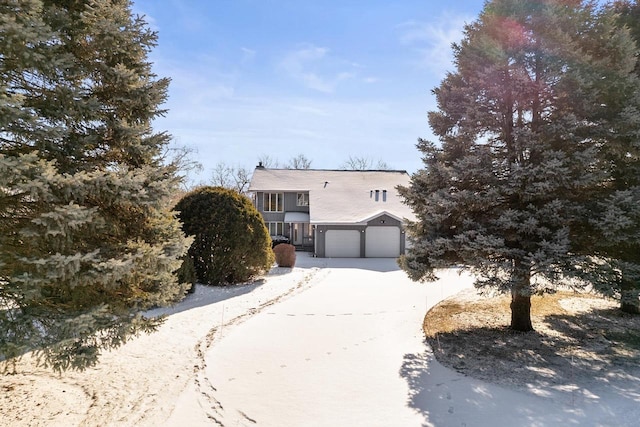 view of front of property featuring a garage