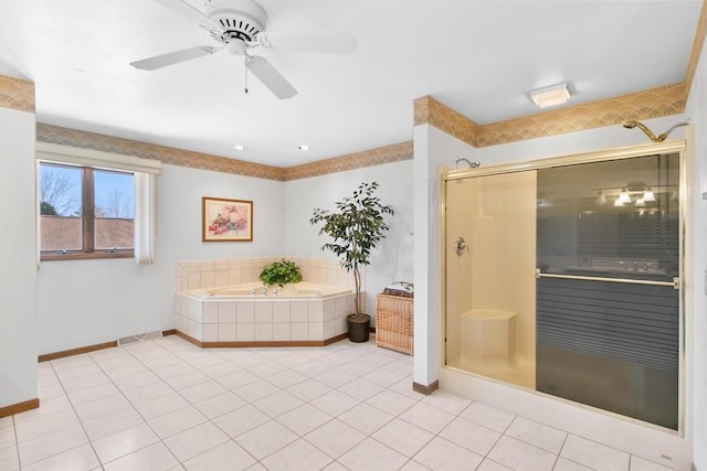 bathroom with tile patterned flooring, plus walk in shower, and ceiling fan