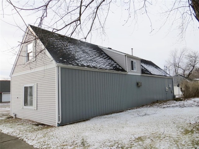 view of snow covered property