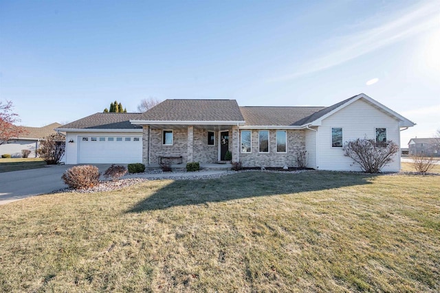 ranch-style home with a front yard and a garage