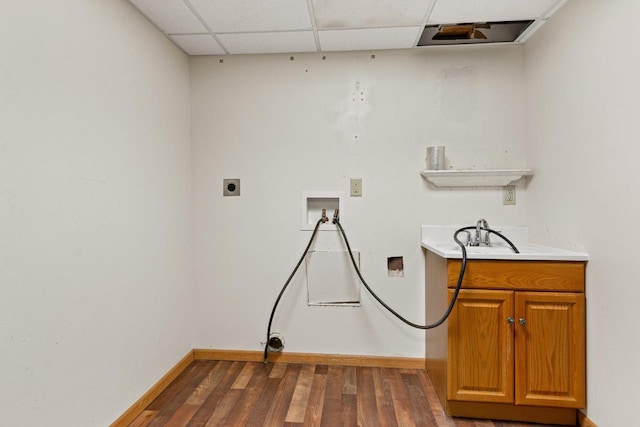 laundry area with electric dryer hookup, cabinets, sink, washer hookup, and dark hardwood / wood-style flooring