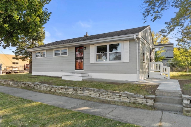 view of front of house with a front lawn