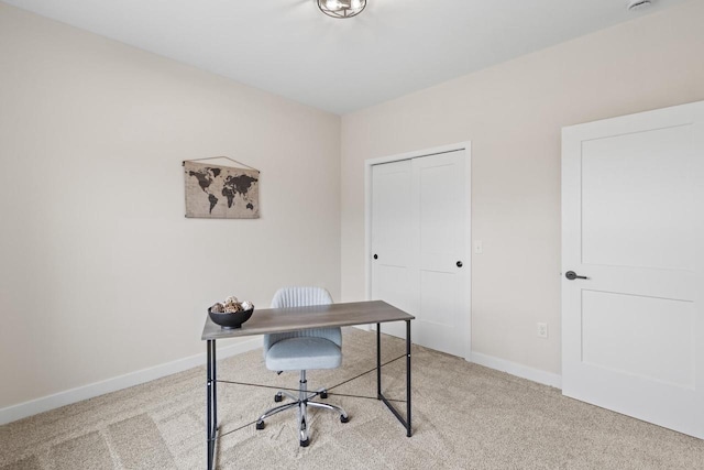 office area with light colored carpet