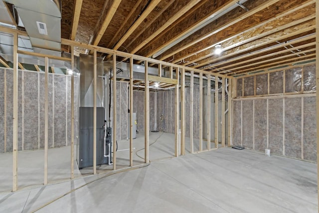 basement featuring water heater