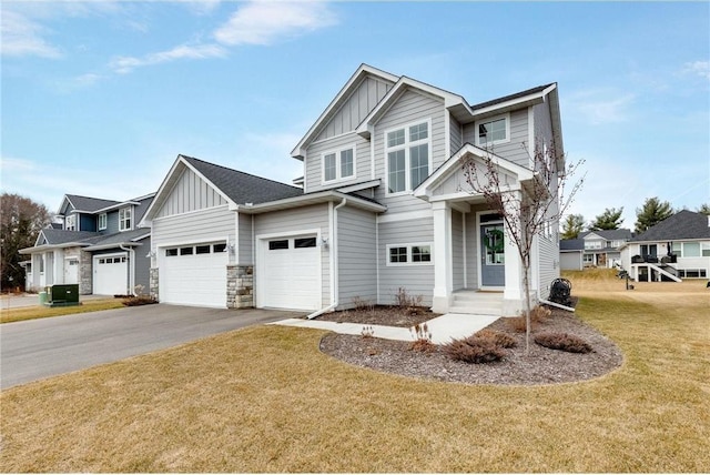 view of front of home featuring a front yard and central AC