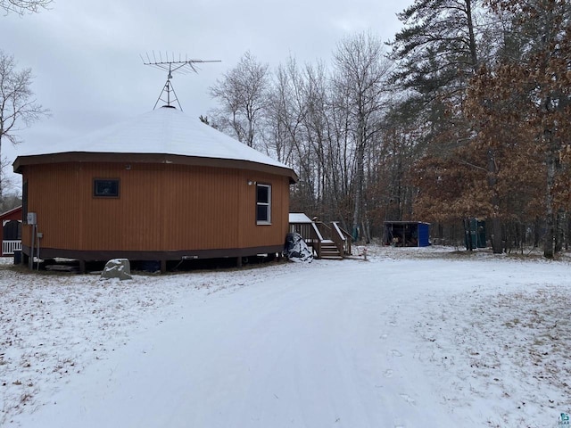 view of snow covered property