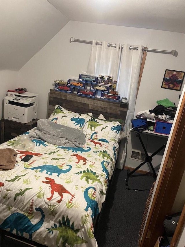 bedroom featuring vaulted ceiling