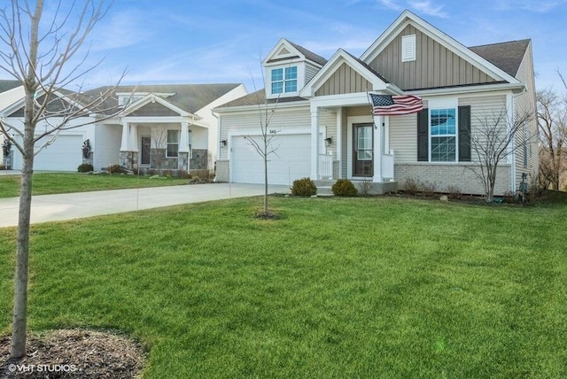 craftsman-style home featuring a garage and a front lawn