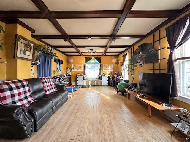 living room with beam ceiling, hardwood / wood-style flooring, and coffered ceiling