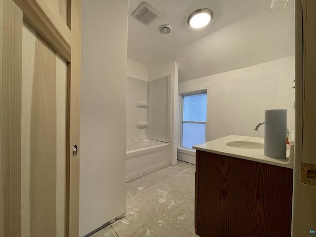 115 8th St E, Ashland, WI 54806 - bathroom featuring lofted ceiling, shower / washtub combination, vanity, and visible vents