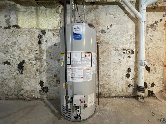115 8th St E, Ashland, WI 54806 - utility room featuring gas water heater