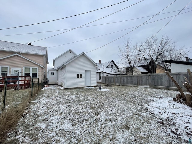 115 8th St E, Ashland, WI 54806 - snow covered property with fence