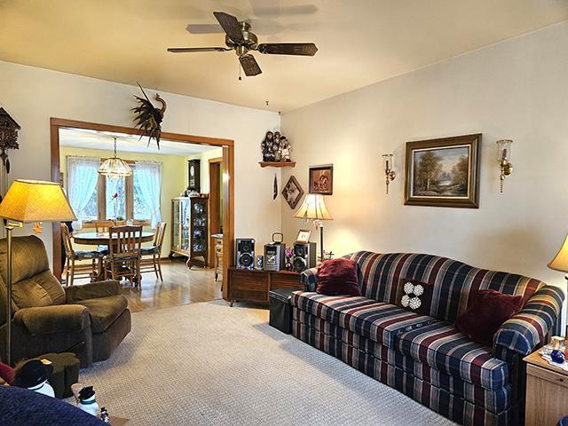 living room with ceiling fan