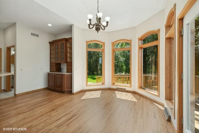 interior space with a notable chandelier