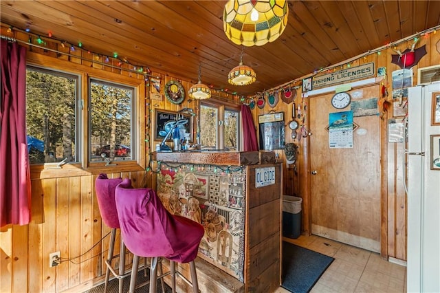 bar with wood ceiling and wood walls