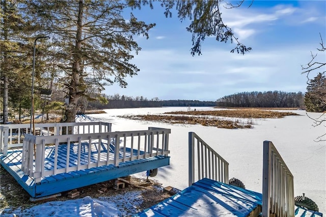 view of snow covered deck