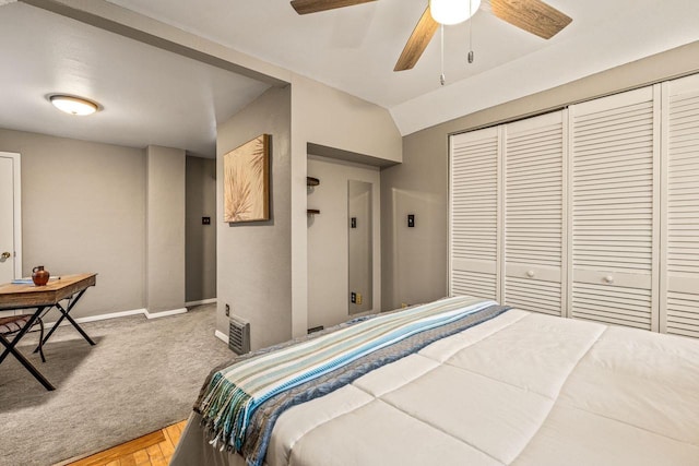 bedroom with ceiling fan and a closet