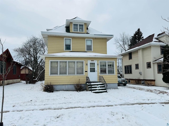 view of snow covered property