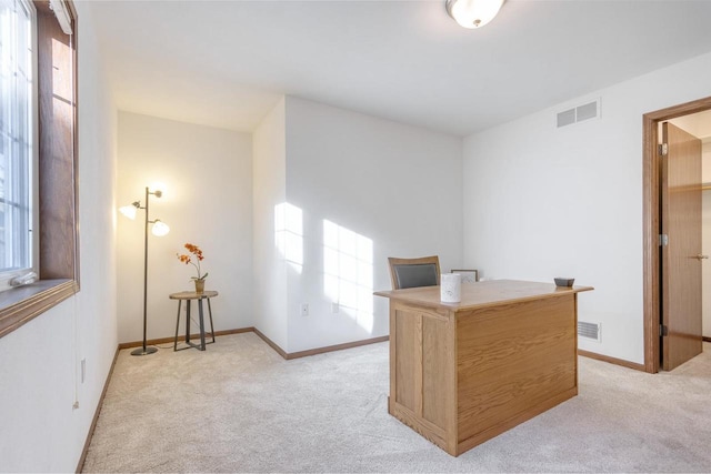 view of carpeted office space