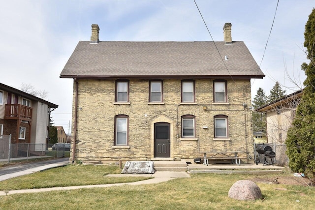 view of front of home with a front yard