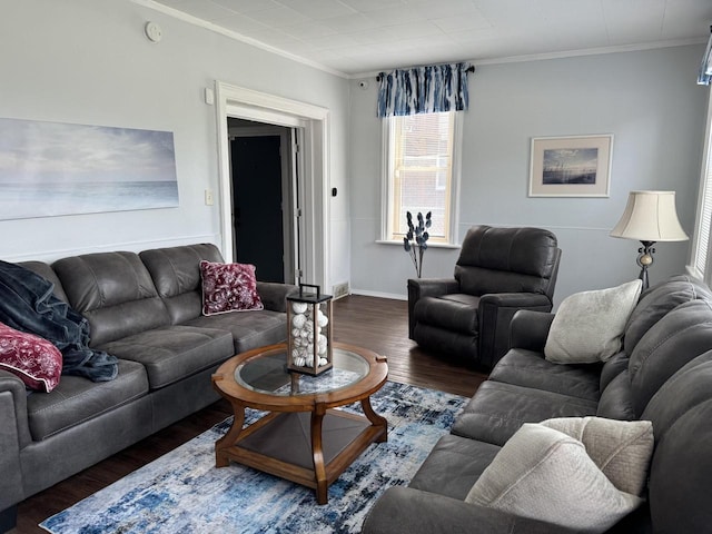 living room featuring dark hardwood / wood-style floors and ornamental molding