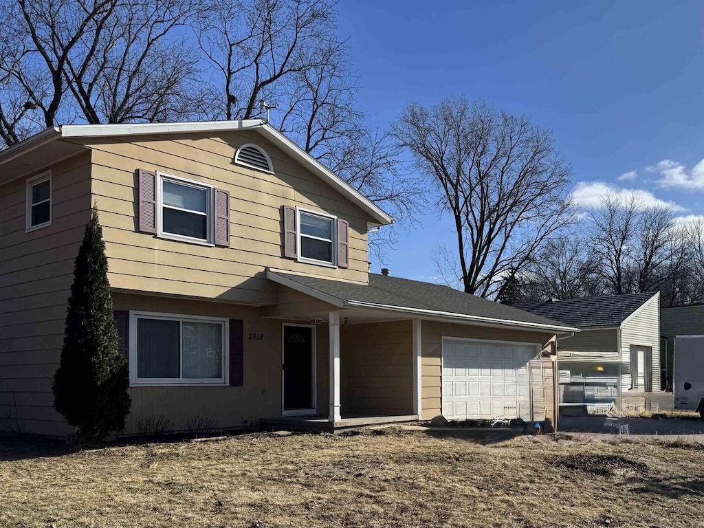 front of property featuring a garage