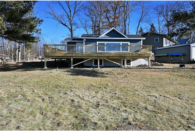 view of front of property featuring a front lawn and a deck