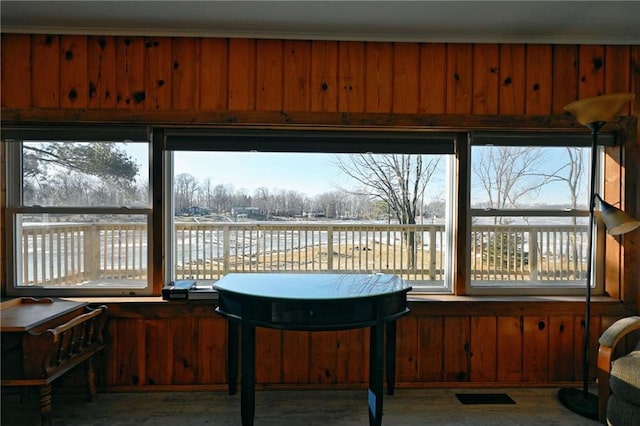 sunroom with a water view