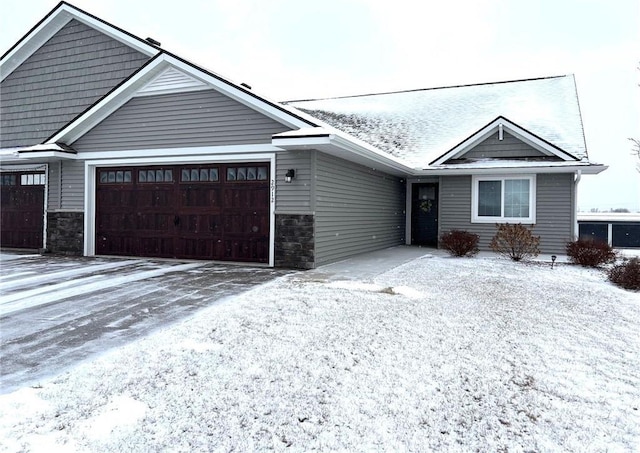 view of front of property with a garage