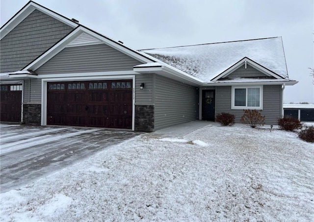 view of front of home with a garage