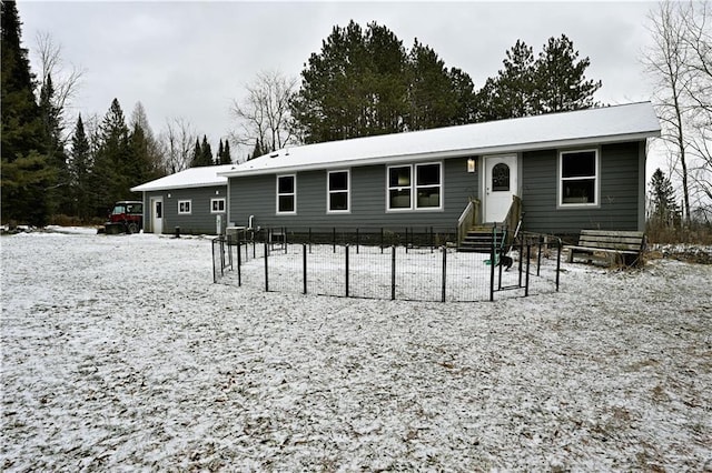 view of snow covered property