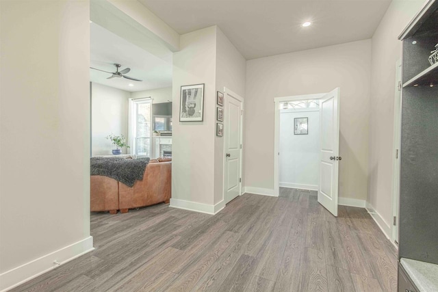 entrance foyer featuring hardwood / wood-style floors and ceiling fan