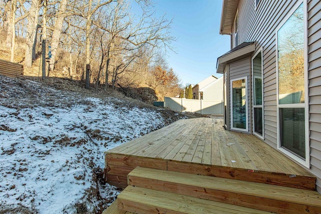 view of snow covered deck