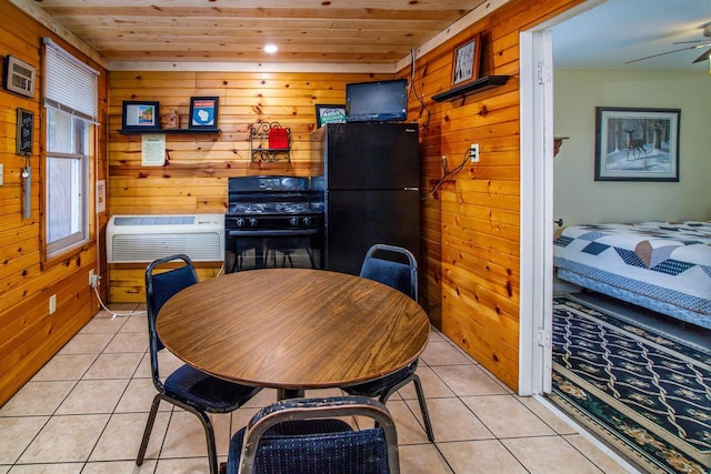 tiled dining area with a wall mounted air conditioner, wood walls, and wooden ceiling