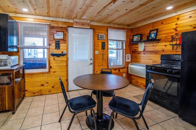 tiled dining area featuring wooden walls and wooden ceiling