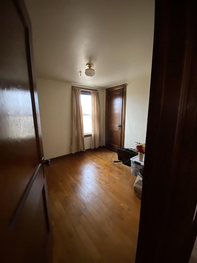 bedroom with light wood-type flooring