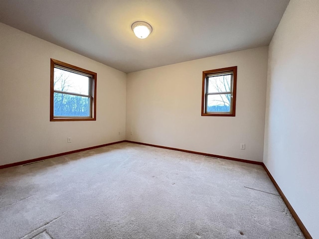 view of carpeted spare room